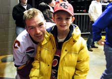 Quad City Flames' Anders Eriksson with Connor