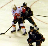 Adam Cracknell working in front of the Aeros' net