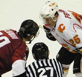 Warren Peters makes a comment before a faceoff